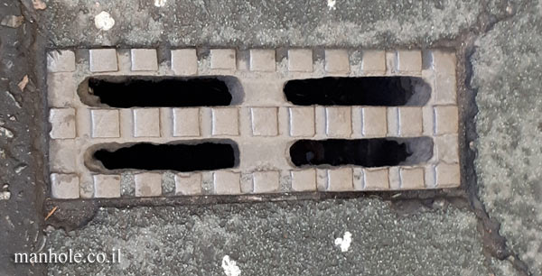 London - narrow rectangular drainage cover