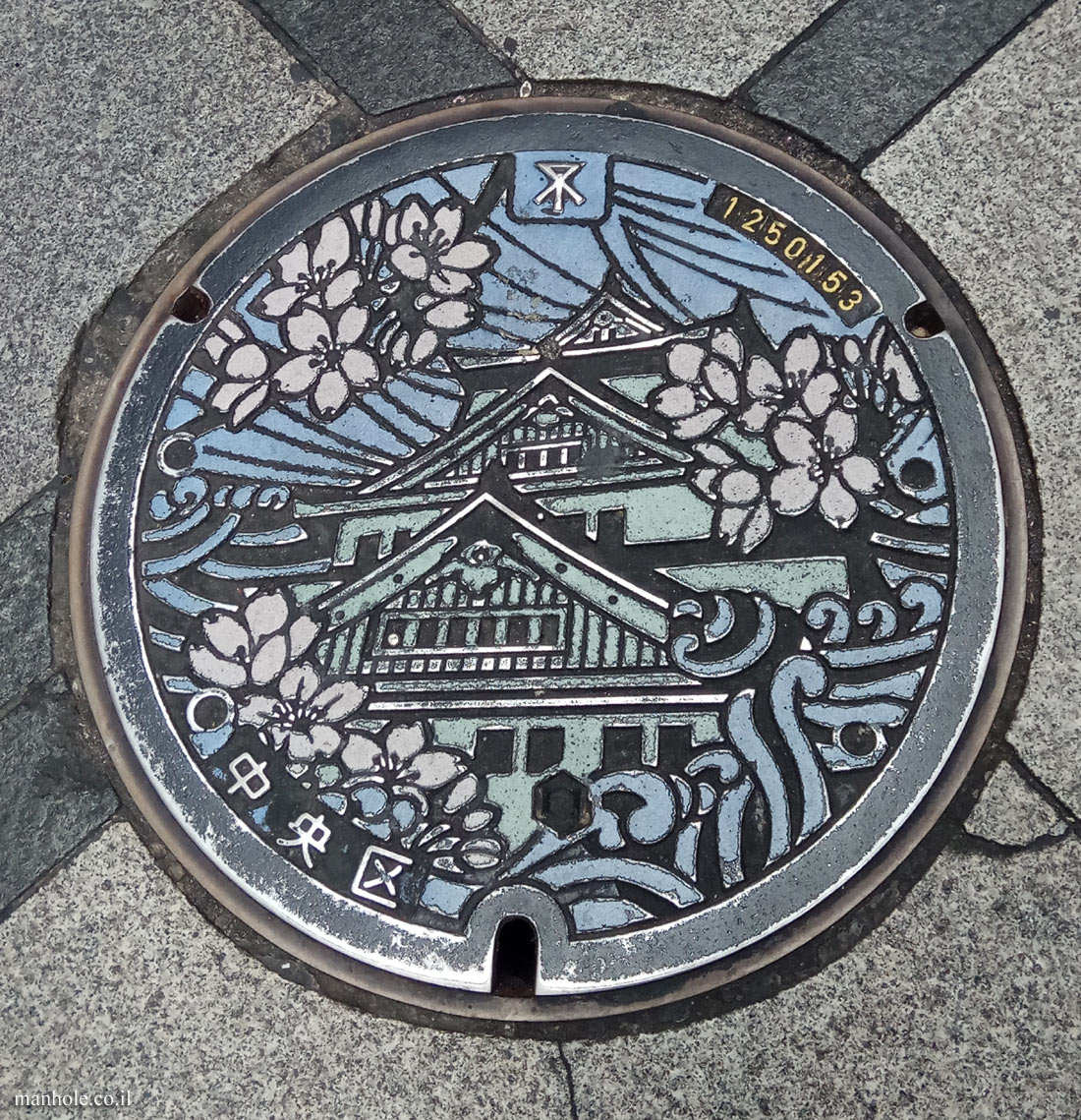 Osaka - A colorful lid with a drawing of Osaka Castle