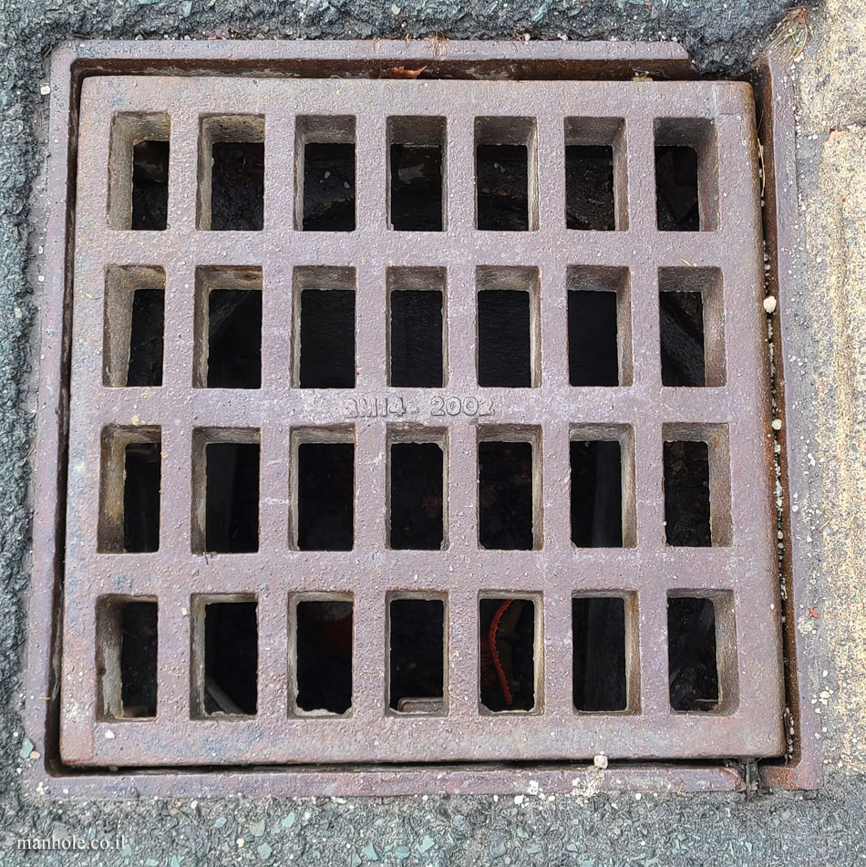St. John’s, NL - Square drain cover - 2002