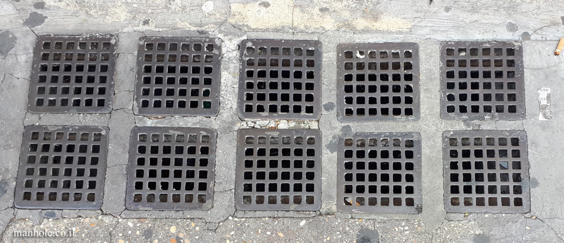 Rome - A drain cover consisting of 10 smaller drainage caps