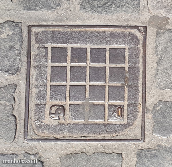 Rome - A small square cover divided into slots