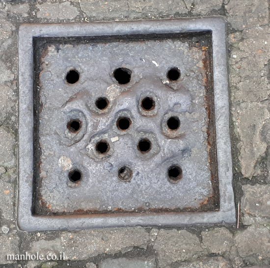 London - Drainage - Camden Market - small square with holes